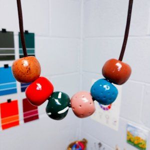 Polymer clay necklace beads: blush, caramel, green